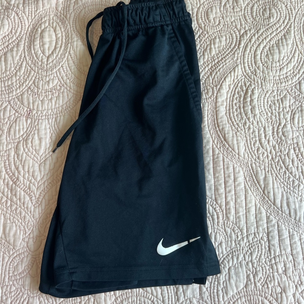 Men’s boys Nike shorts. Some sign of ware in the logo
